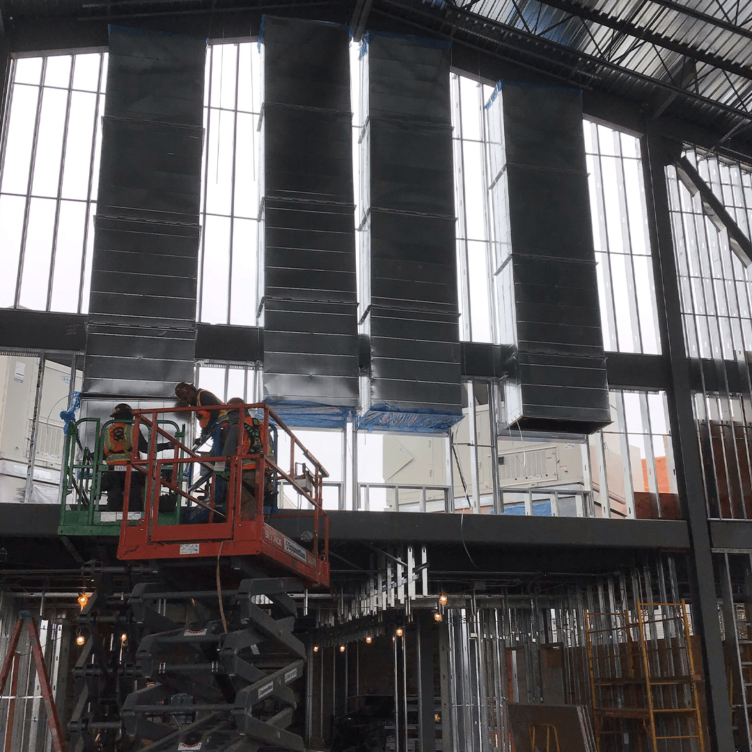 Custom fabricated HVAC ductwork on shop floor