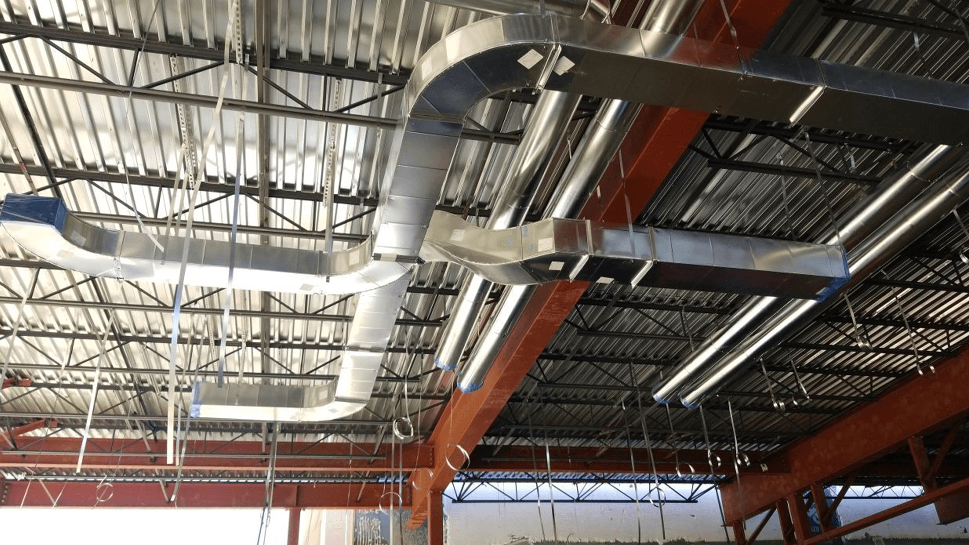 Precision sheet metal duct work in industrial facility